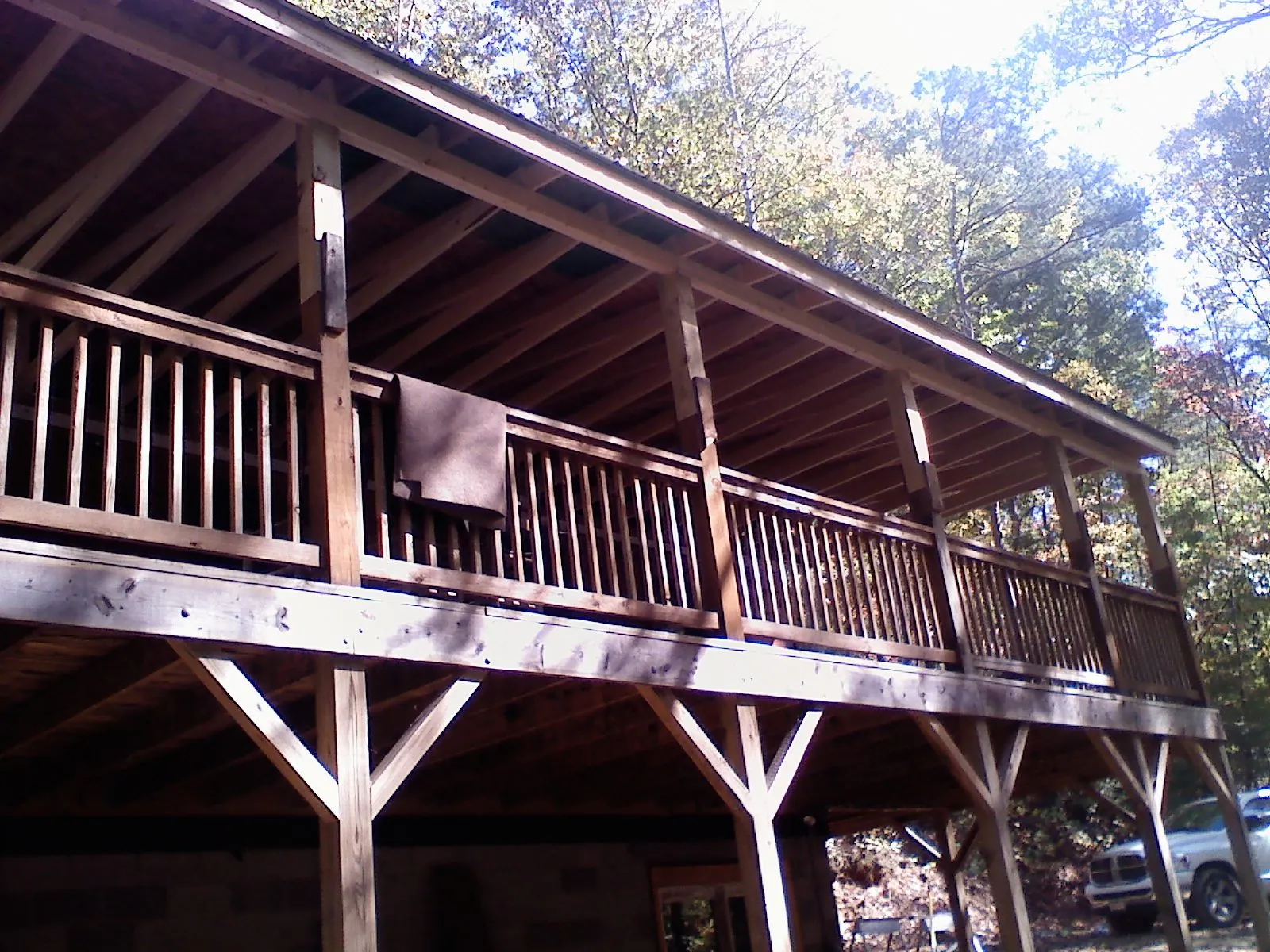 Timber framing under a new elevated porch and deck — Roof Leak Repair in Olympia Fields by Roofing Brothers
